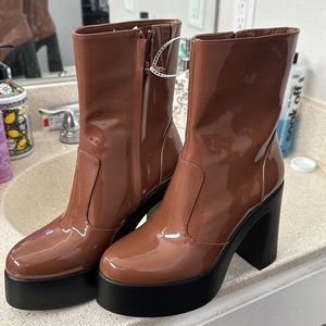 GB.   Ankle boot.  I have.  1.   Size.  8.5.  And.  1.  Size.  6.5